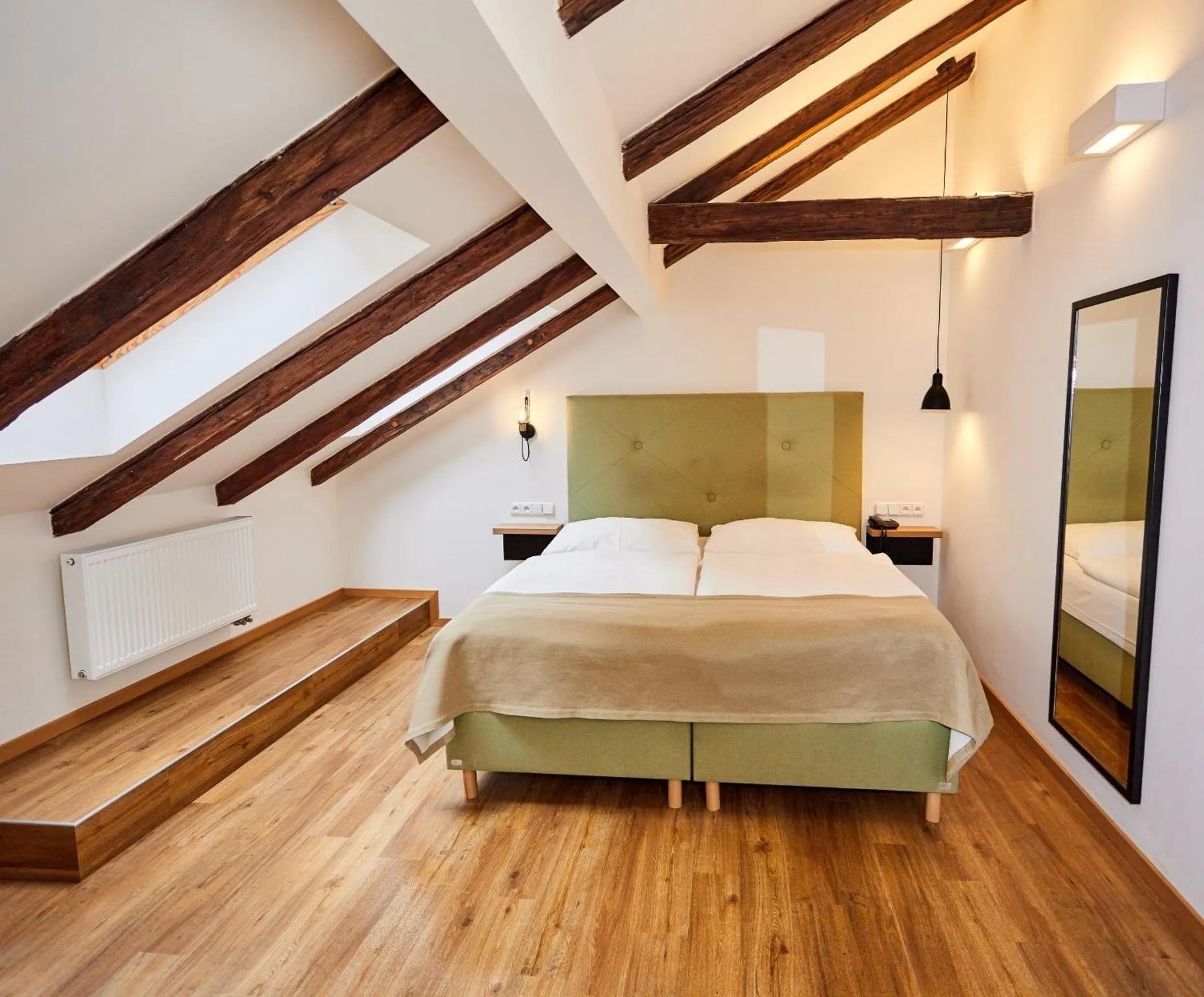 Standard double room interior with seating